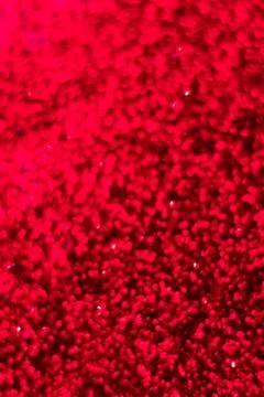 Red glitter texture. Festive sparkling sequins background closeup. Wpaper for Stock Photos