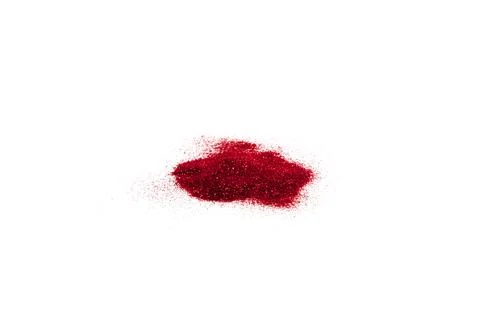 Red glitters on the white Stock Photos