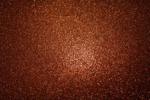 Red glittery background with light in the centre Foto stock