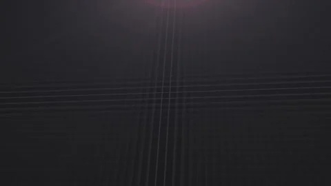 Red glow falls over technical grid pattern turning on black background Video stock 313267627