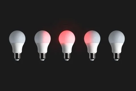 Red glowing bulb on black background. Idea, influence, leadership concept. Illustrazione stock