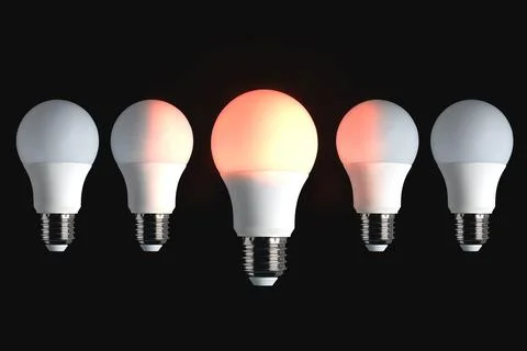 Red glowing bulb on black background. Idea, influence, leadership concept. Illustrazione stock