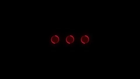 Red glowing circles pulsating in a rhythmic pattern on black background for.. Stock Footage 345549855