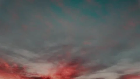 Red Glowing Clouds Dark Teal Sky 4K timelapse Stock Footage 337348586