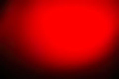 Red glowing light with dark background for design Illustrazione stock
