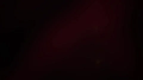 Red Glowing Particles Floating in Dark Cinematic Abstract Background Loop Stock Footage 344724308