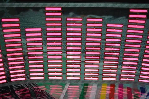 Red glowing plastic equalizer, electronics glowing to the music. 스톡 사진