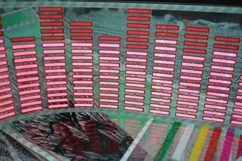 Red glowing plastic equalizer, electronics glowing to the music. 스톡 사진