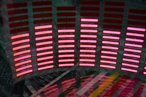 Red glowing plastic equalizer, electronics glowing to the music. 스톡 사진
