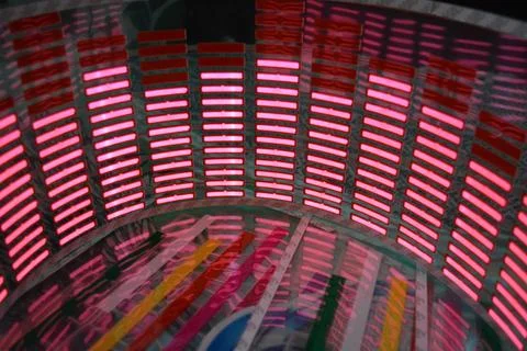 Red glowing plastic equalizer, electronics glowing to the music. 스톡 사진