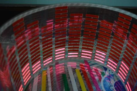 Red glowing plastic equalizer, electronics glowing to the music. 스톡 사진