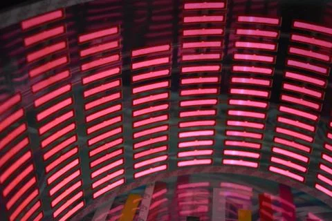 Red glowing plastic equalizer, electronics glowing to the music. 写真素材