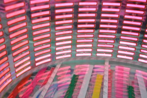 Red glowing plastic equalizer, electronics glowing to the music. 스톡 사진