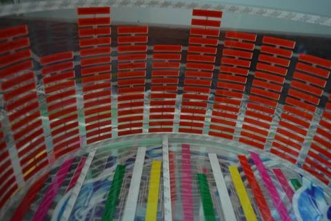 Red glowing plastic equalizer, electronics glowing to the music. 스톡 사진