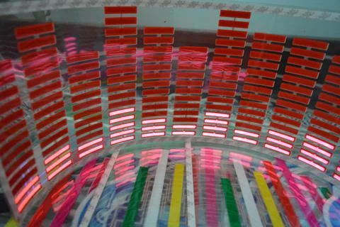 Red glowing plastic equalizer, electronics glowing to the music. 스톡 사진