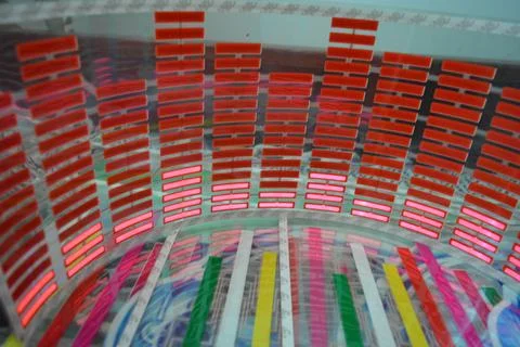 Red glowing plastic equalizer, electronics glowing to the music. 스톡 사진