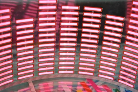 Red glowing plastic equalizer, electronics glowing to the music. 写真素材