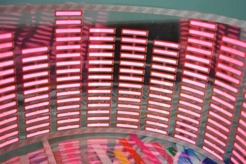 Red glowing plastic equalizer, electronics glowing to the music. 스톡 사진