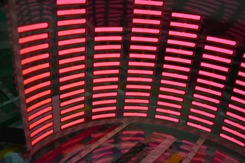 Red glowing plastic equalizer, electronics glowing to the music. 스톡 사진