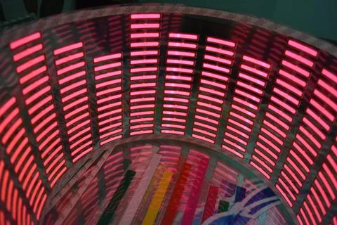 Red glowing plastic equalizer, electronics glowing to the music. 스톡 사진