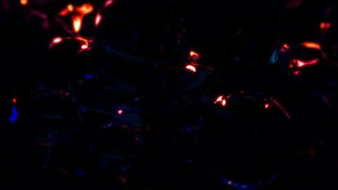 Red glowing translucent crystal spheres on black background イラスト素材