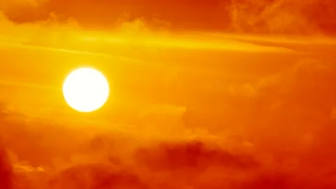 Red gold clouds, white sun, sunrise - sky background - Real Time - flying birds Stock Footage 152564423