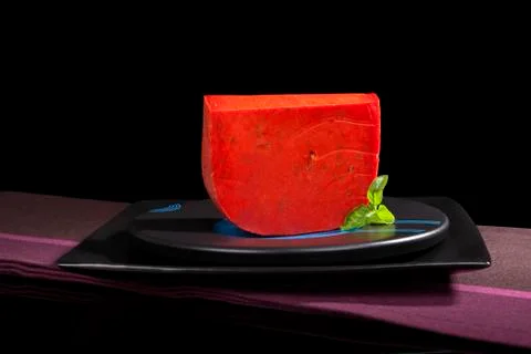 Red gouda cheese. Stock Photos