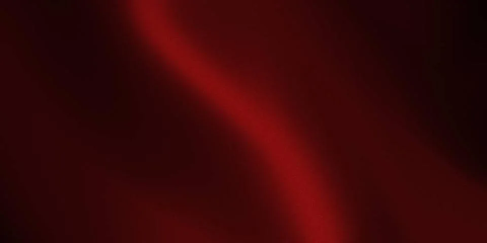 Red gradient background with a textured grain and a soft luminous effect R... Stock Photos