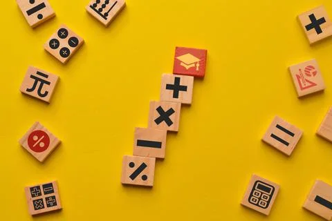Red graduation cap and math symbols isolated on yellow background. I love mat Stock Photos