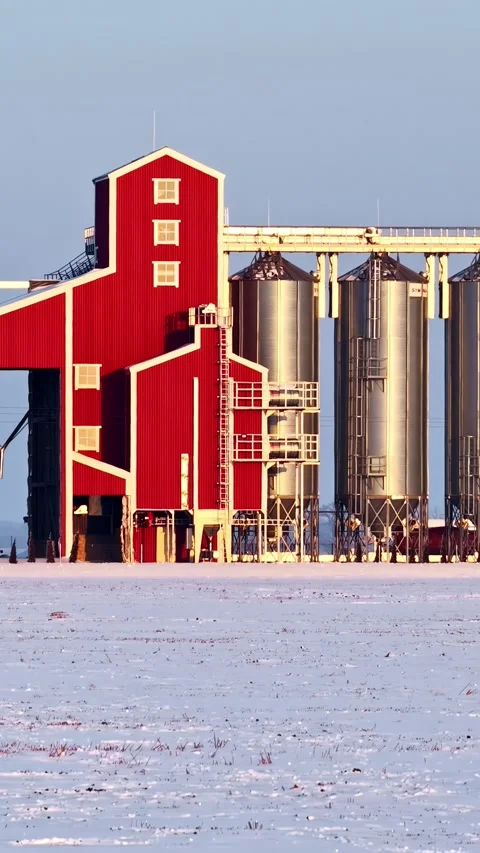 Red Grain Elevator And Steel Silos In Snowy Winter Landscape Stock Footage 336232268