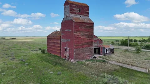 Red grain elevator with a ladder on the side Stock Footage 313810585
