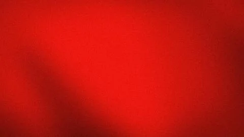 Red grainy abstract background 4K texture wallpaper with a blurred gradient.. Stock Photos