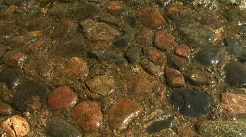 Red granite under water Stock Footage 7500474