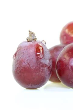 Red grape isolated on white. Stock Photos