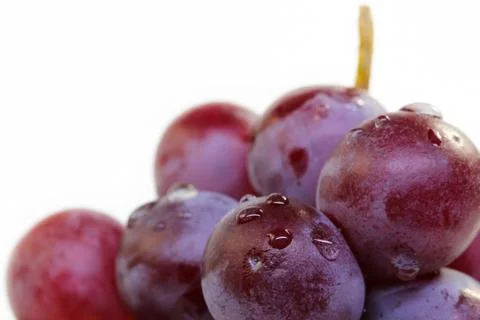 Red grape isolated on white. Stock Photos