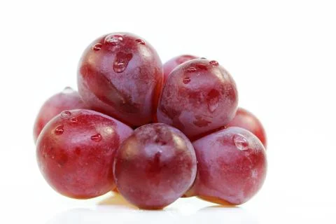 Red grape isolated on white. Stock Photos