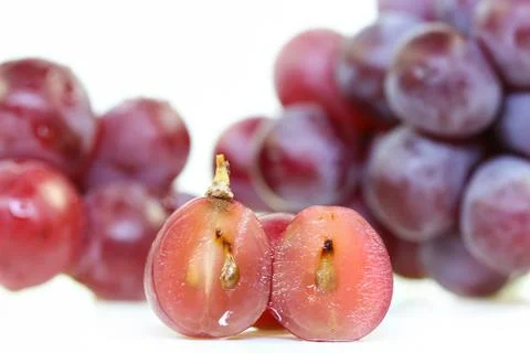 Red grape isolated on white. Stock Photos
