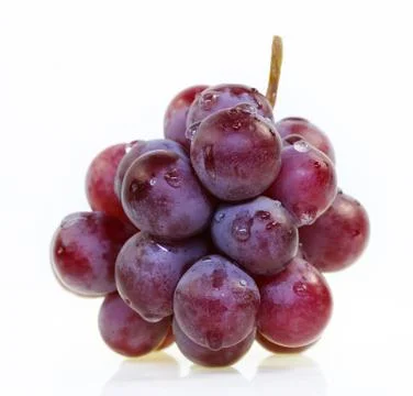 Red grape isolated on white. Stock Photos