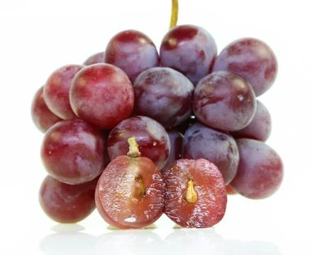 Red grape isolated on white. Stock Photos
