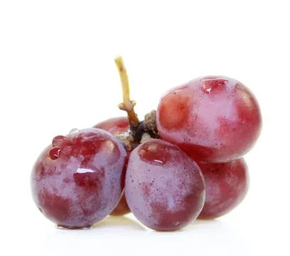 Red grape isolated on white. Stock Photos