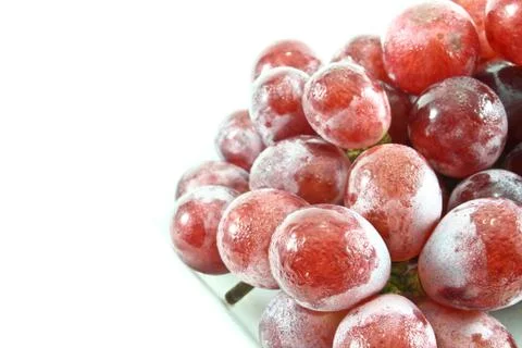 Red grape on white background Stockfoto's