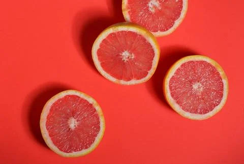 Red grapefruit halves Stock Photos