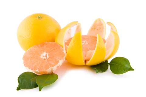 Red grapefruits with leafs Stock Photos