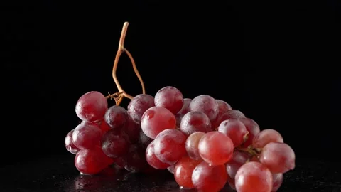 Red grapes close up on black background Stock Footage 140534832
