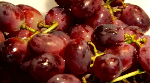 Red grapes fascicle rotating in front of camera Stock Footage 44321748