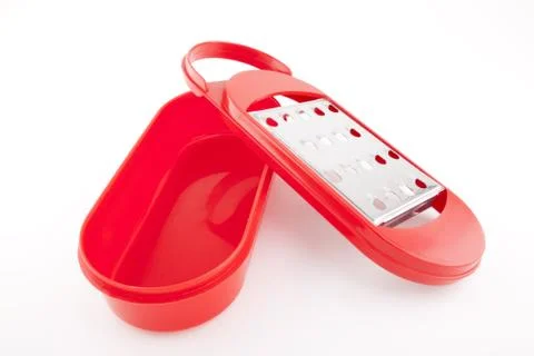 Red grater isolated on white Stock Photos