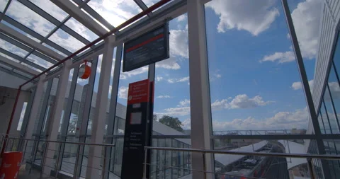 Red-gray train arrivals, departs from the ground metro station Stock Footage 119640414