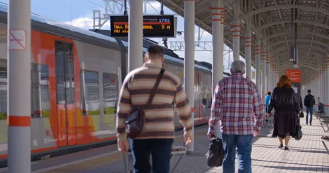 Red-gray train arrivals from the ground metro station Stock Footage 119639746
