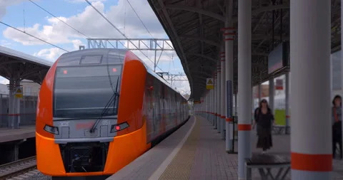 Red-gray train departs from the ground metro station Stock Footage 119637105