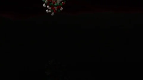 Red Green And White Candy Fall And Slide Across Black Table Stock Footage 70333802